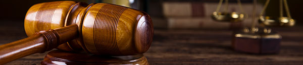 stockfresh_4020870_wooden-gavel-barrister-justice-concept-legal-system_resized